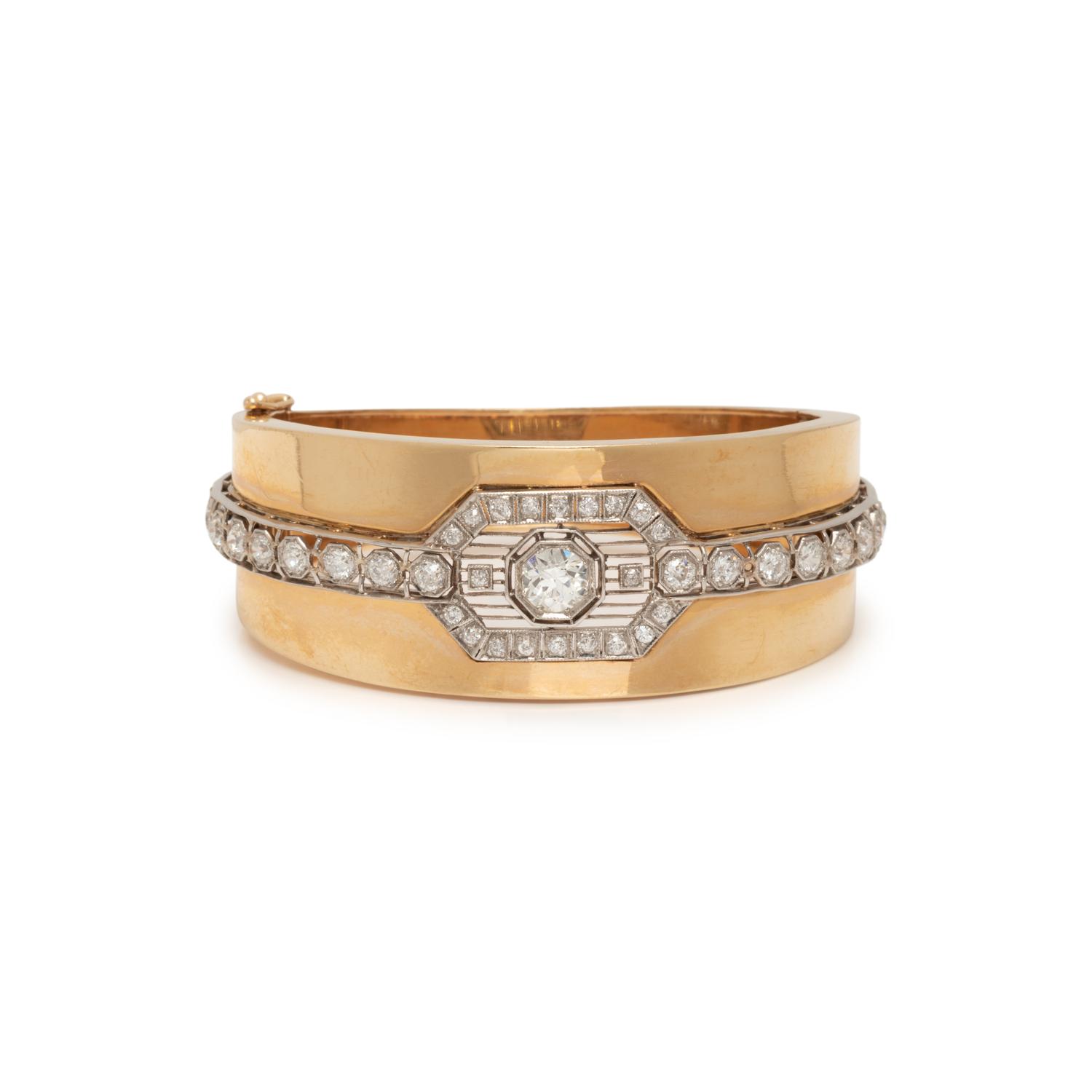 YELLOW GOLD, PLATINUM AND DIAMOND BANGLE BRACELET