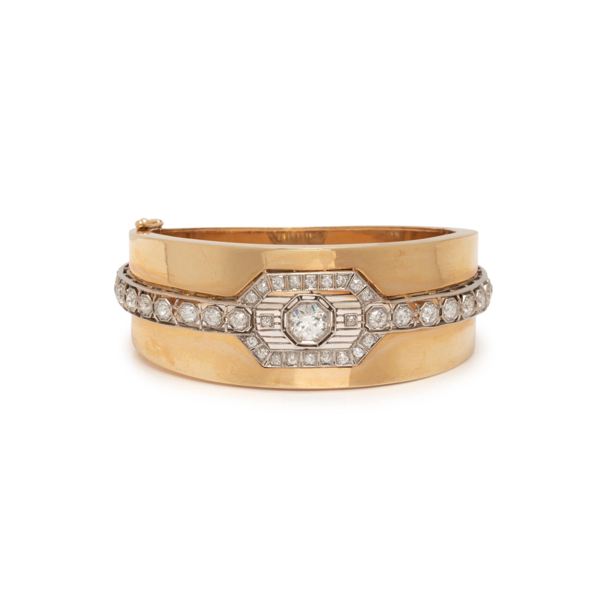 YELLOW GOLD, PLATINUM AND DIAMOND BANGLE BRACELET