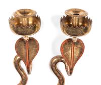 A Pair of Brass Cobra Single-Light Sconces and a Bronze Single-Light Cobra Sconce