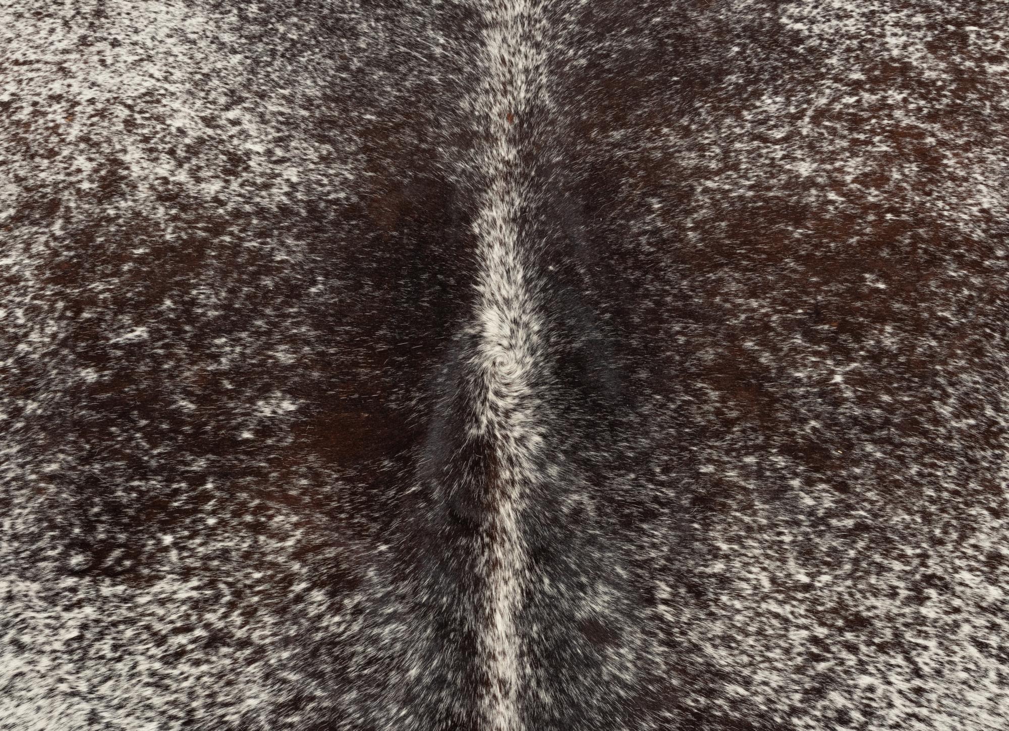 A Pair of Faux Cowhide Rugs