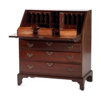 A Chippendale Figured and Shell-Carved Mahogany Slant Front Desk