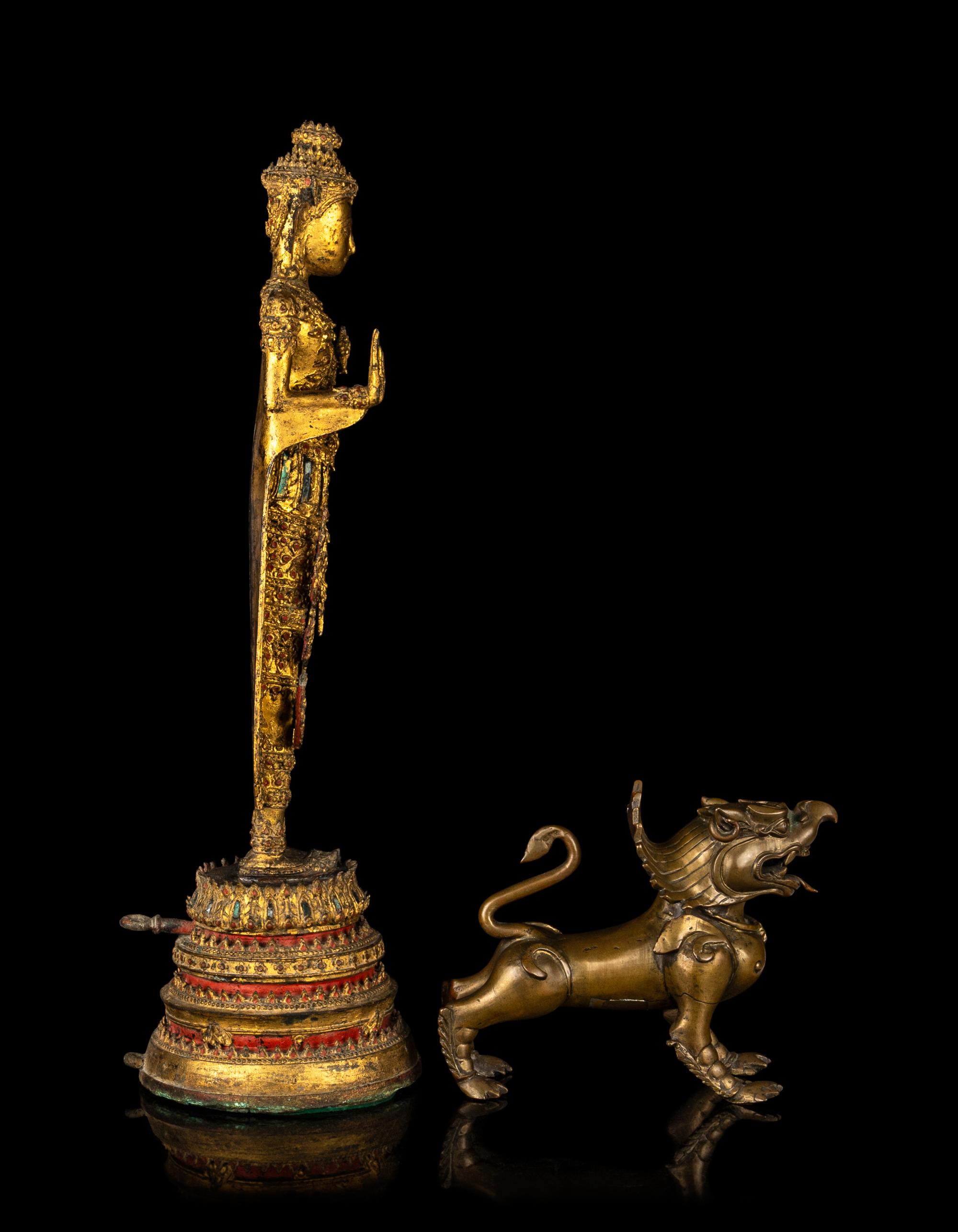 A Thai Gilt Bronze Figure of Standing Buddha and a Southeast Asian Bronze Figure of a Mythical Beast