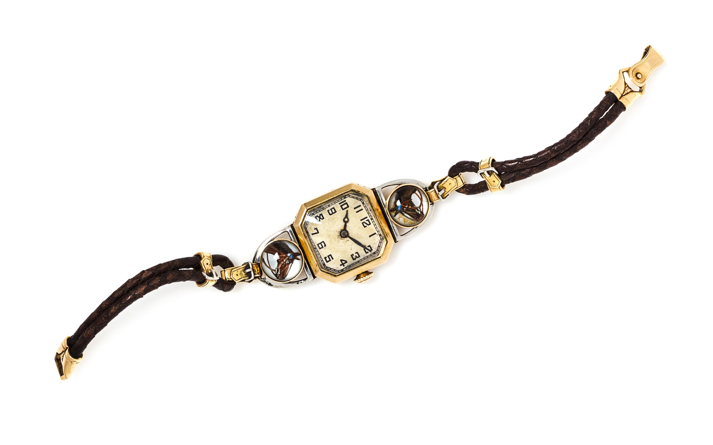 An 18 Karat Yellow Gold, Platinum and Horse Motif Essex Crystal Wristwatch, Henry Blank & Co. for C.H. Meylan,