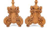 A Pair of Continental Carved Wood Prickets