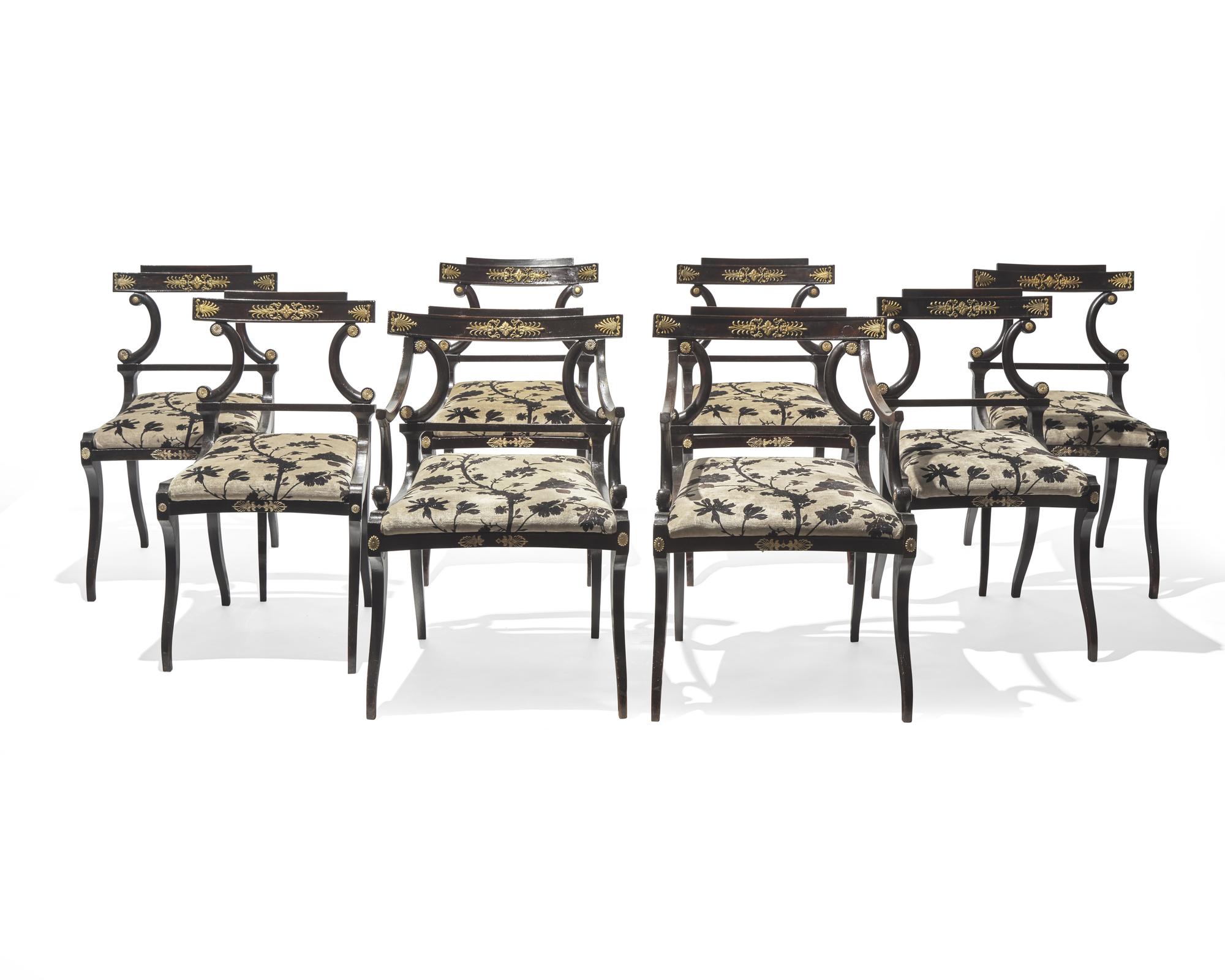 A set of eight Neoclassical gilt-bronze mounted ebonized dining chairs, possibly Baltic Region, circa 1820
