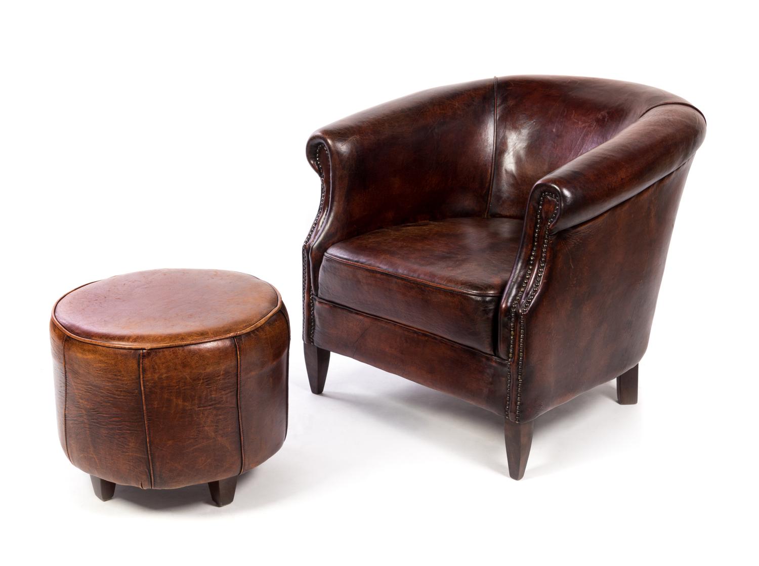 A Leather Upholstered Club Chair and Ottoman Height of club chair 31 inches. — LATE 20TH CENTURY
