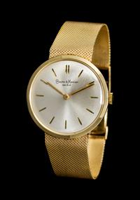A 14 Karat Yellow Gold Wristwatch, Baume & Mercier,