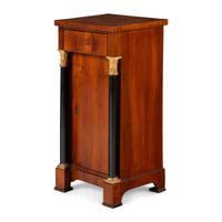 An Austrian Neoclassical Fruitwood, Ebonized and Parcel Gilt Side Cabinet