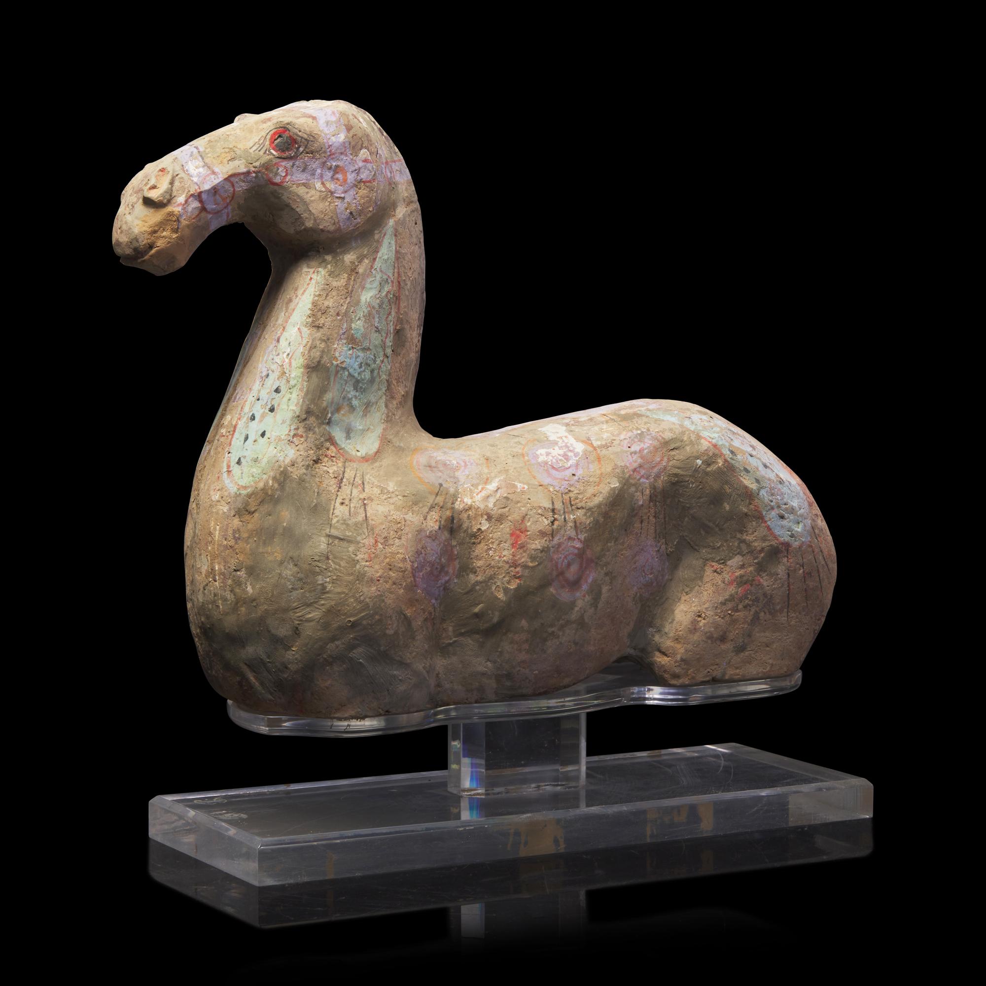 A Chinese Painted Grey Pottery Figure of Recumbent Horse, Han Dynasty 漢 彩繪灰陶馬