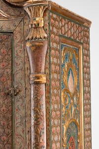 A Continental Painted and Parcel Gilt Cabinet