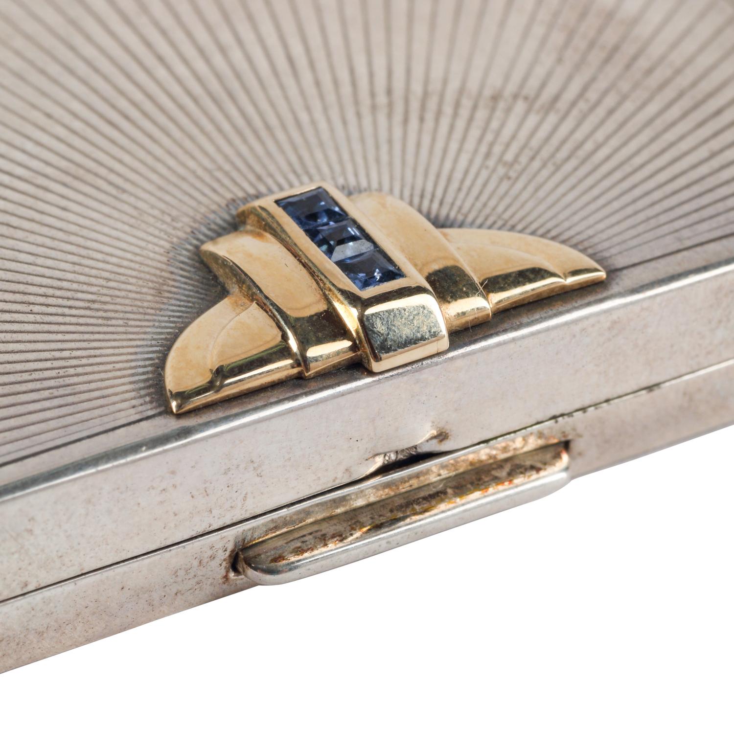 A Cartier-Retailed Silver, 14 Karat Gold and Sapphire Compact