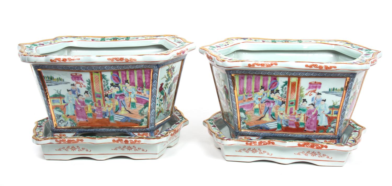 A Pair of Chinese Rose Mandarin Style Porcelain Jardinieres Height 9 3/4 inches; length of undertray 15 inches. — 20TH CENTURY