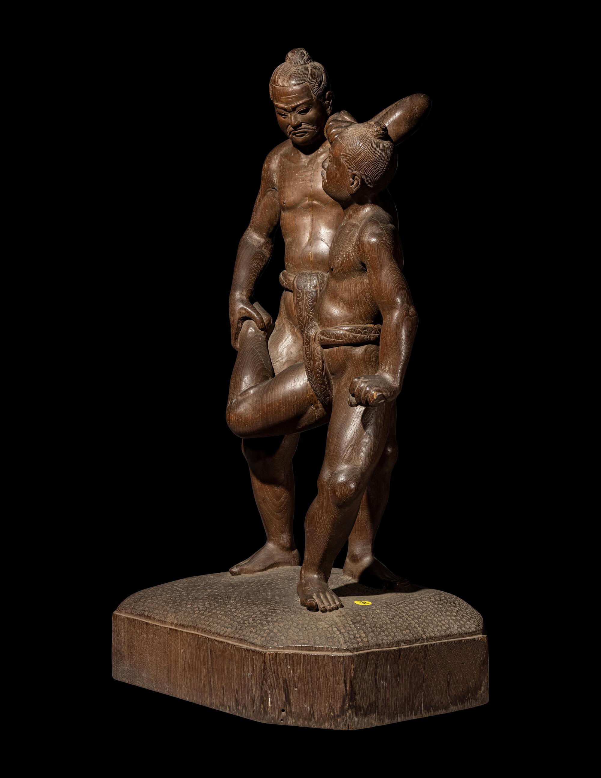 A Large Japanese Carved Wood Figural Group of Wrestlers
