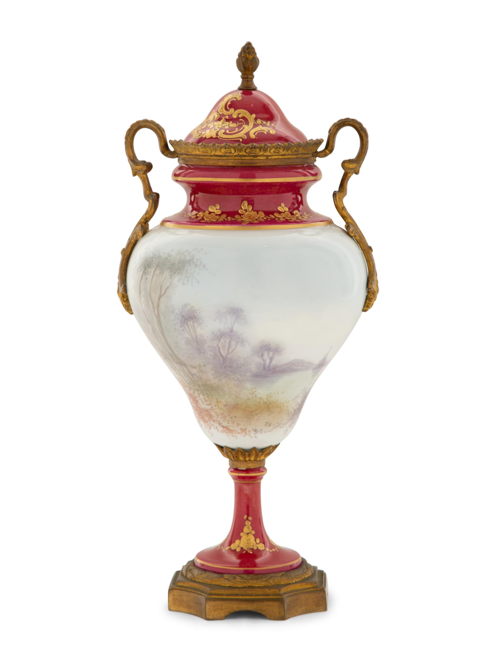 A Gilt Metal Mounted Sèvres Style Porcelain Urn