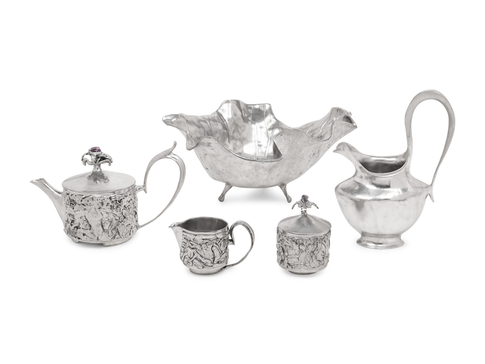 A Collection of Castor Cooper Pewter Stemware
