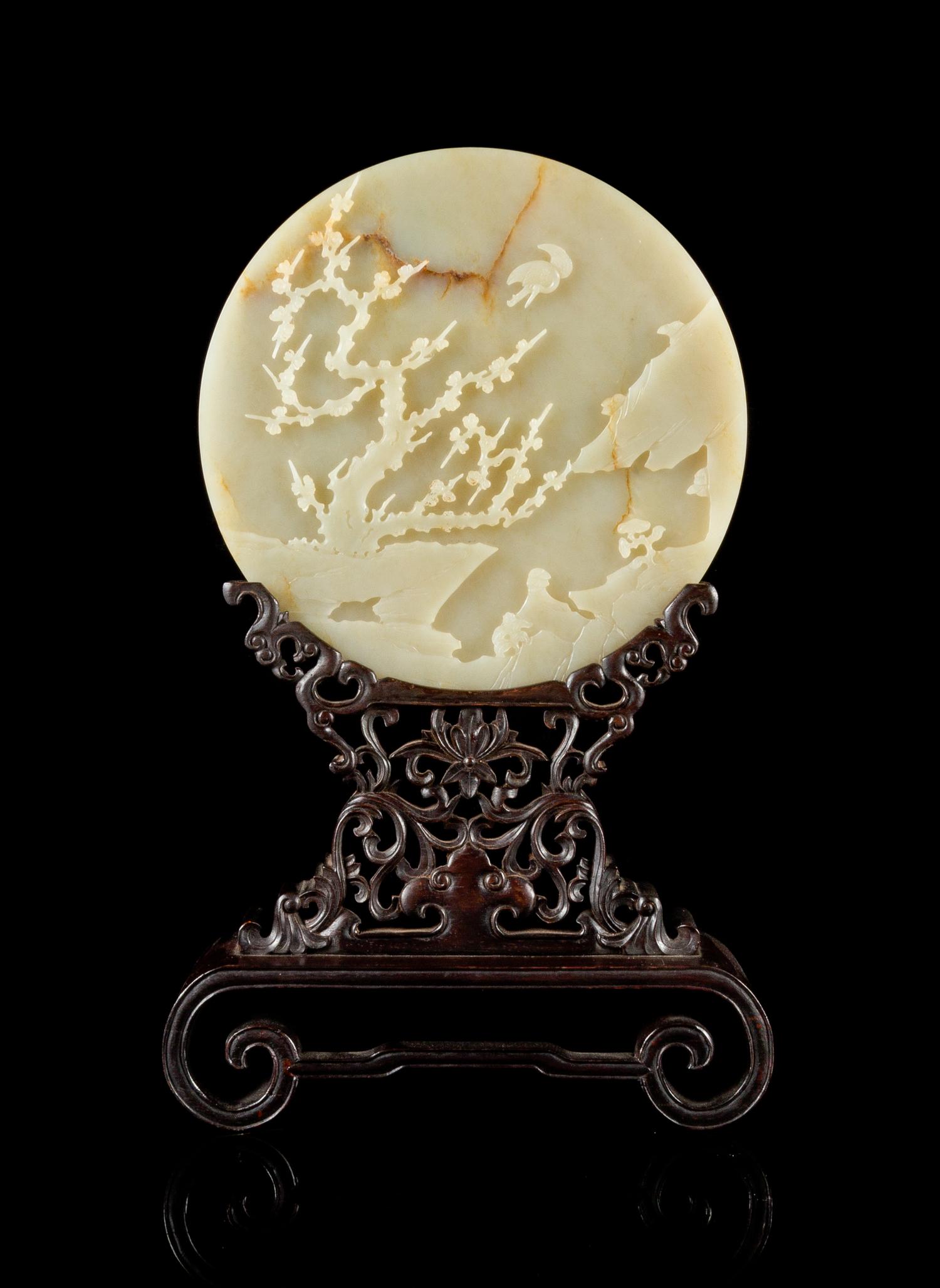 A Carved Celadon Jade Table Screen Diameter of jade 8 1/4 inches. — QING DYNASTY