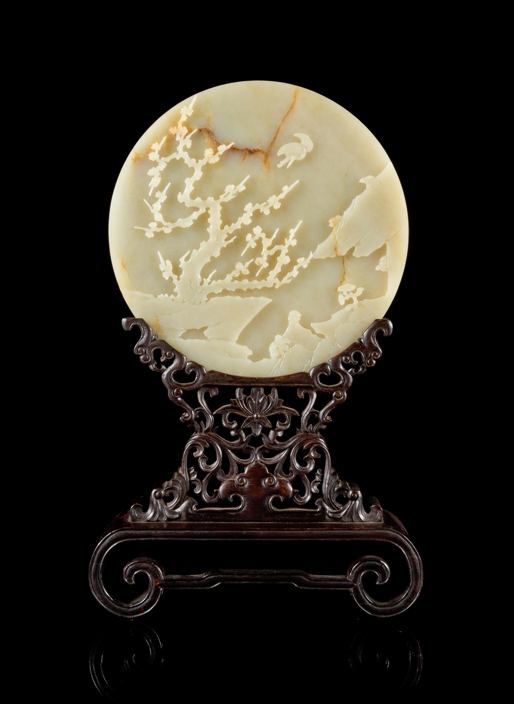 A Carved Celadon Jade Table Screen Diameter of jade 8 1/4 inches. — QING DYNASTY