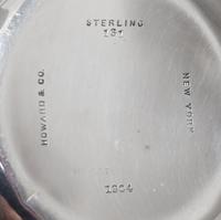 Two American Silver Boxes, Gorham and Howard & Co., 19th/20th Century, comprising an oval pin box by Gorham and a circular lidded powde