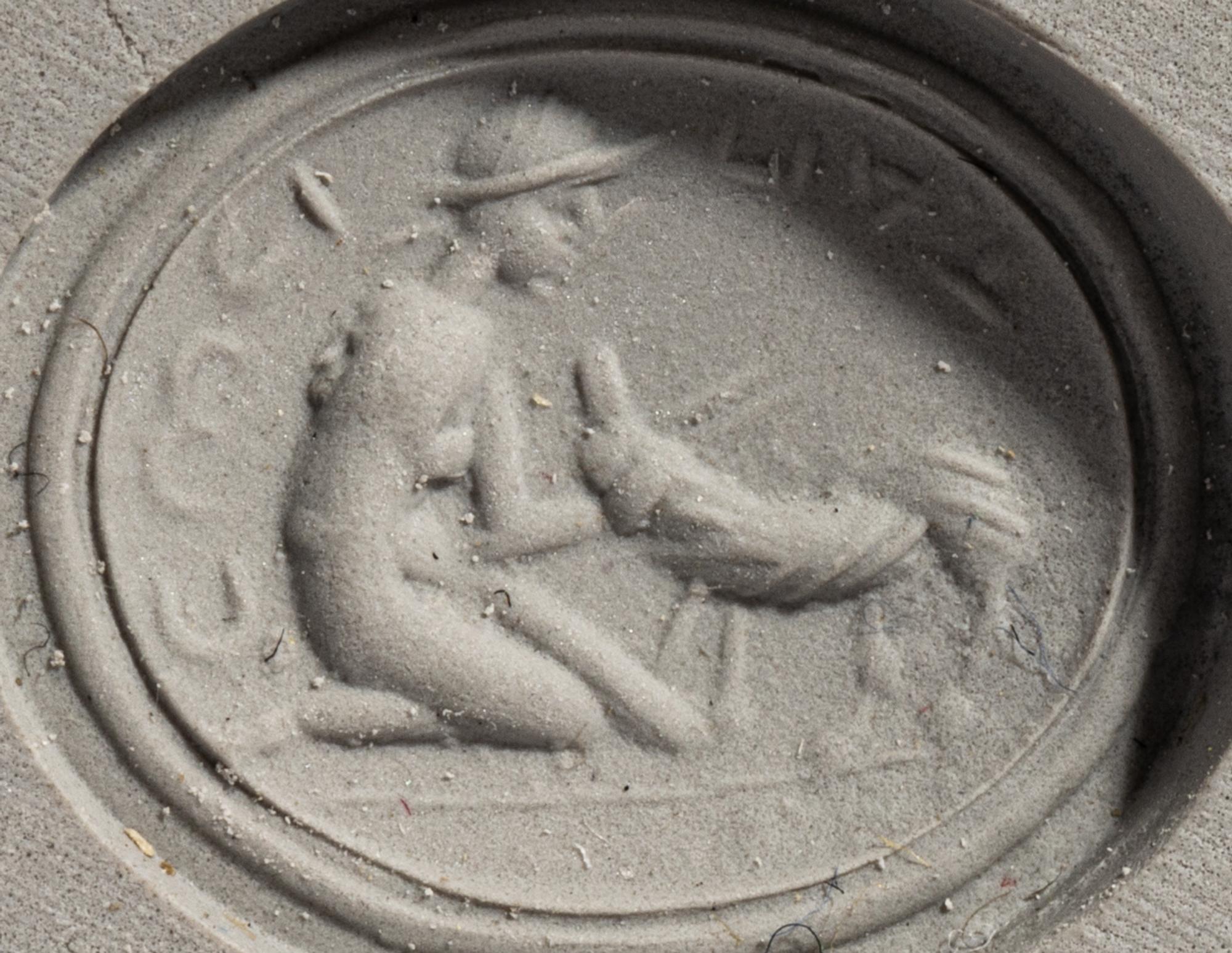 A Roman Carnelian Ring Stone with the God Mercury and a Sheep — Set in a gold ring