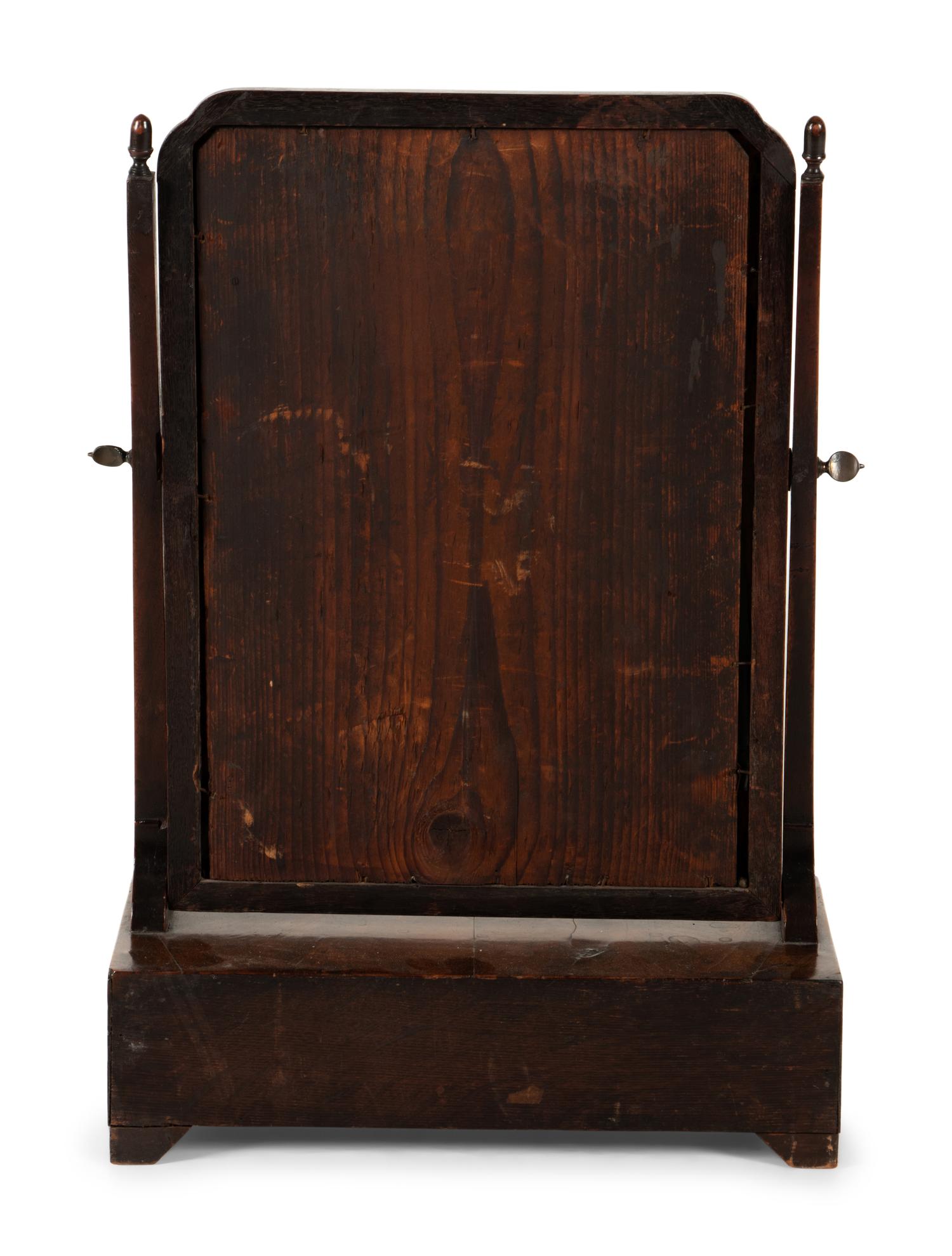 A George II Parcel Gilt Walnut Dressing Mirror