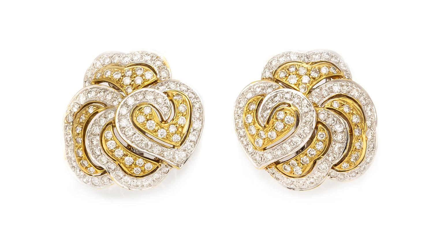A Pair of 18 Karat Gold and Diamond Earclips, 10.40 dwts.