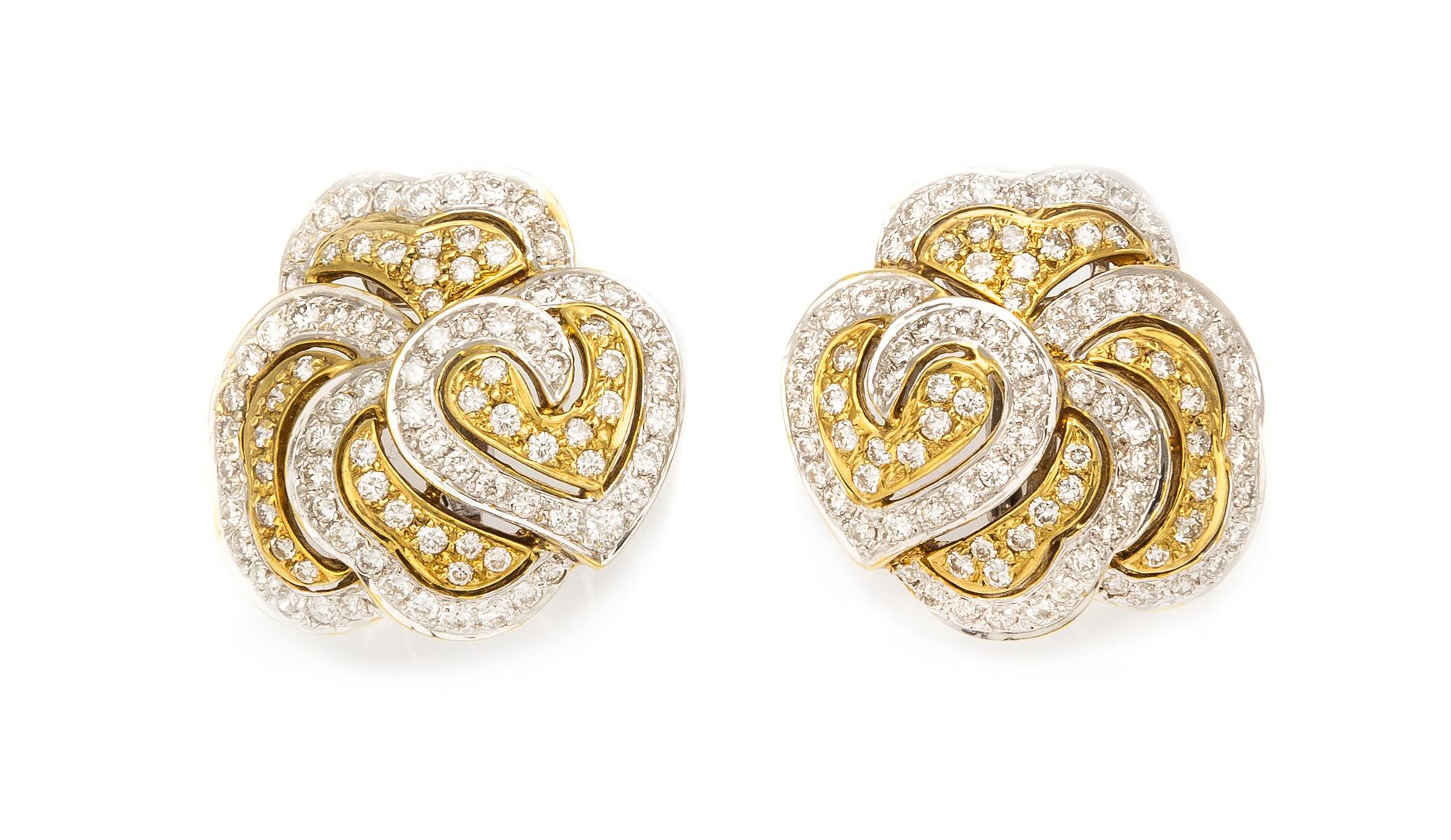 A Pair of 18 Karat Gold and Diamond Earclips, 10.40 dwts.
