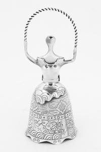 An American Silver Figural Bell, The Lincoln Mint, Second Half 20th Century, Alice in Wonderland by Salvador Dali with fitted case.