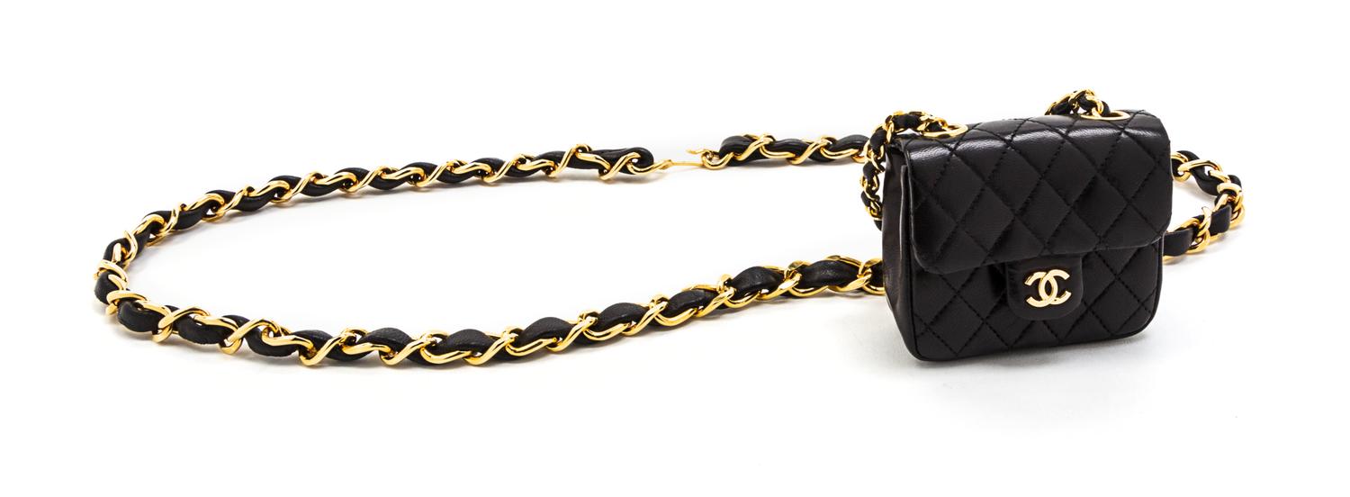 A Chanel Black Leather Quilted Flap Bag on a Belt, 3 1/2 x 3 x 1 1/2 inches.