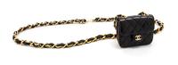 A Chanel Black Leather Quilted Flap Bag on a Belt, 3 1/2 x 3 x 1 1/2 inches.