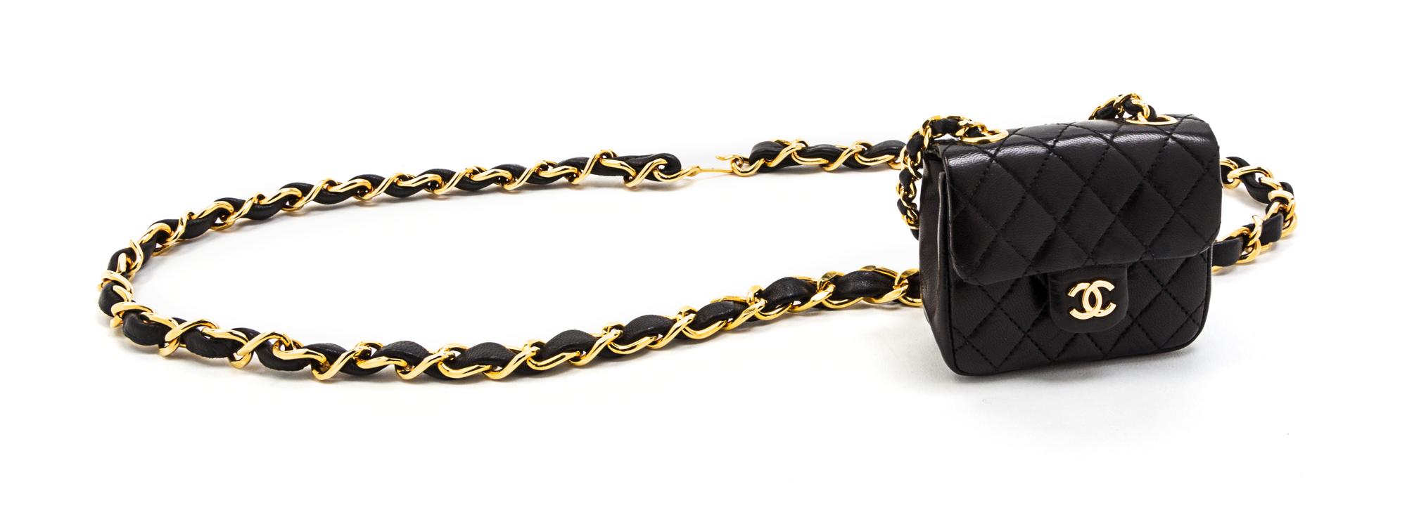 A Chanel Black Leather Quilted Flap Bag on a Belt, 3 1/2 x 3 x 1 1/2 inches.