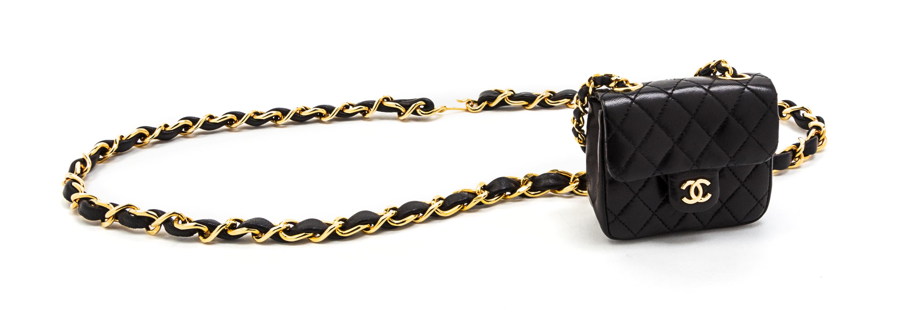 A Chanel Black Leather Quilted Flap Bag on a Belt, 3 1/2 x 3 x 1 1/2 inches.