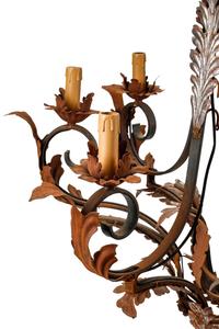 A Pair of Spanish Iron and Tole Eight-Light Chandeliers