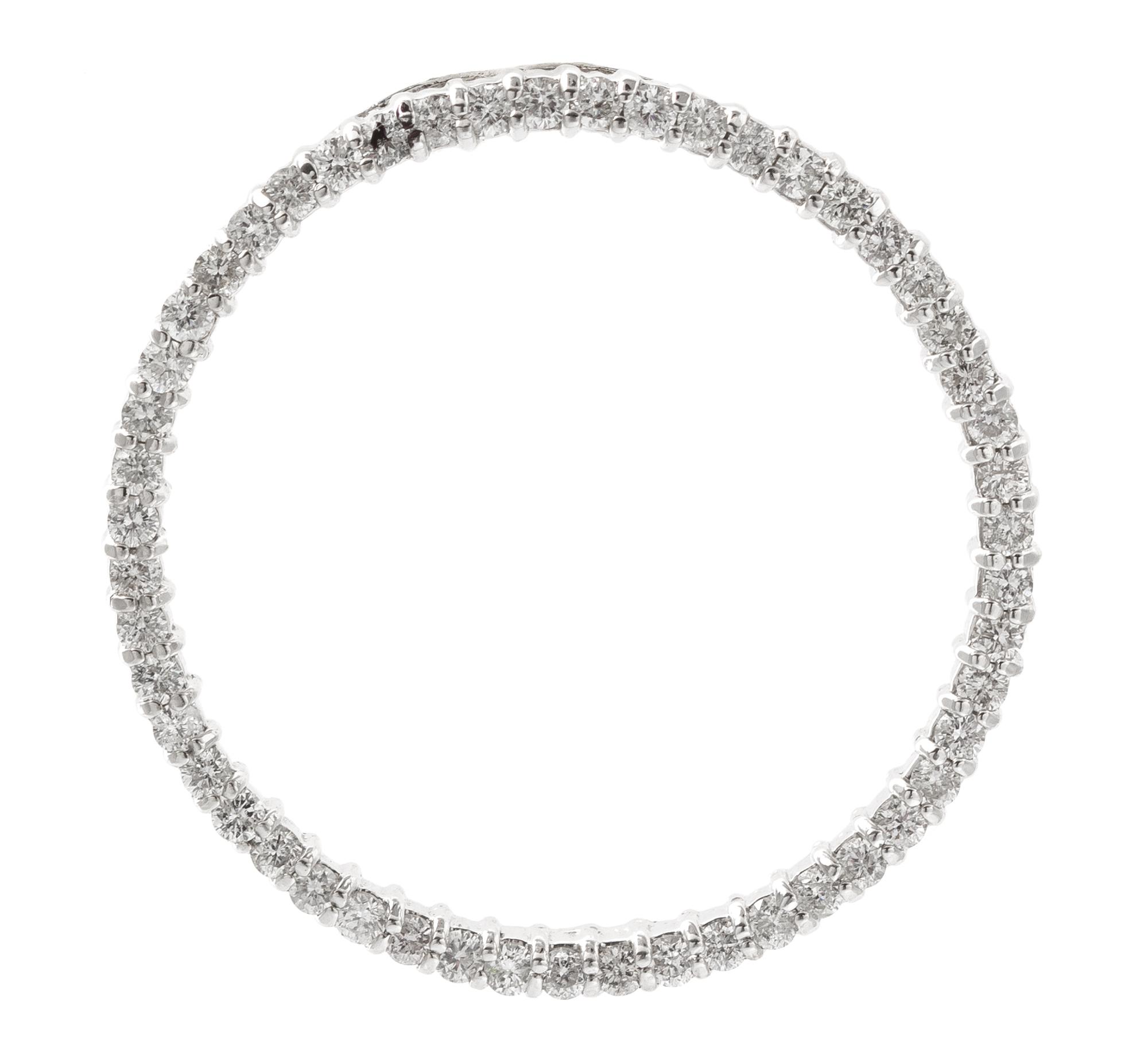 A 14 Karat White Gold and Diamond Circle Pendant, 3.20 dwts.