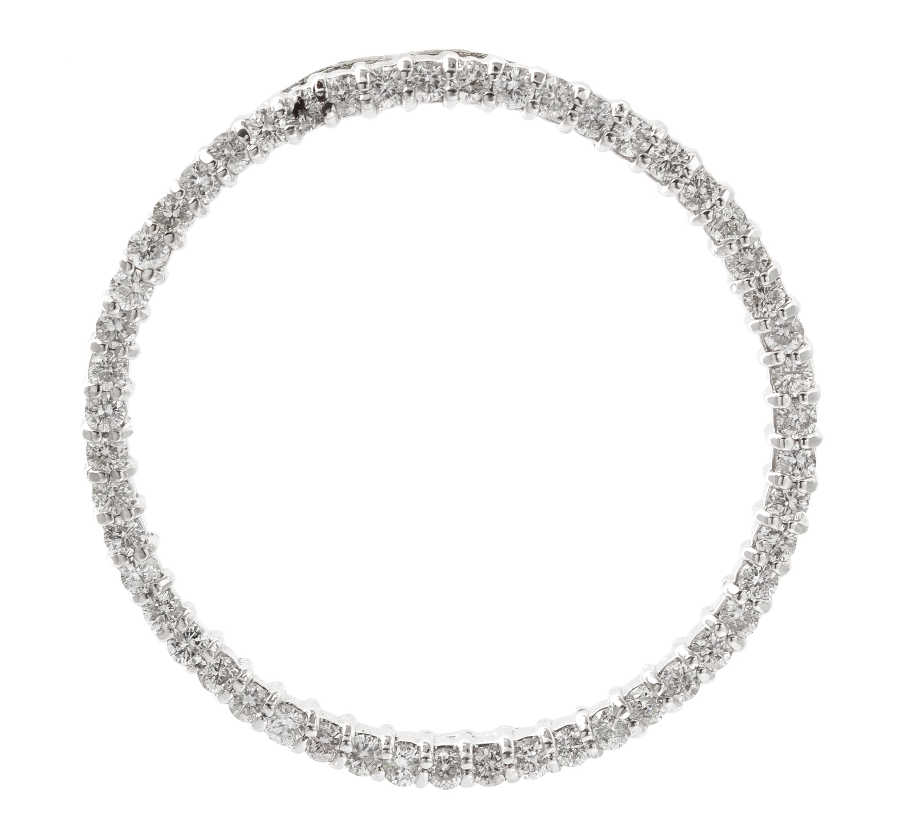 A 14 Karat White Gold and Diamond Circle Pendant, 3.20 dwts.