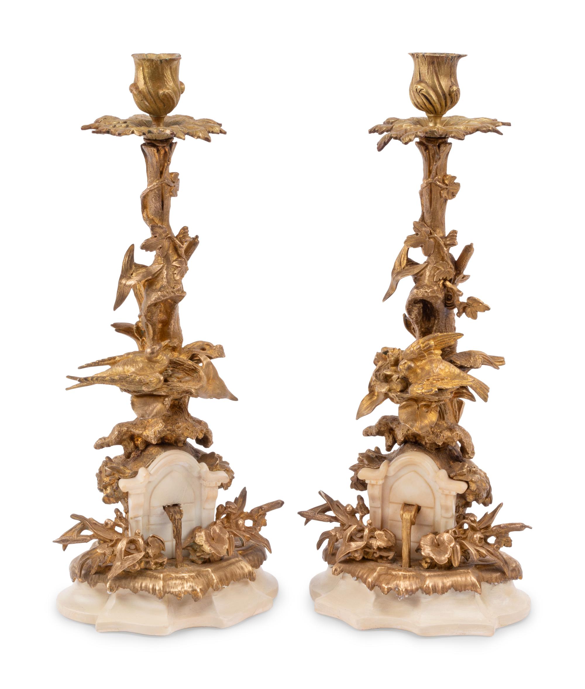 A Pair of Napoleon III Silvered Bronze and Marble Candlesticks