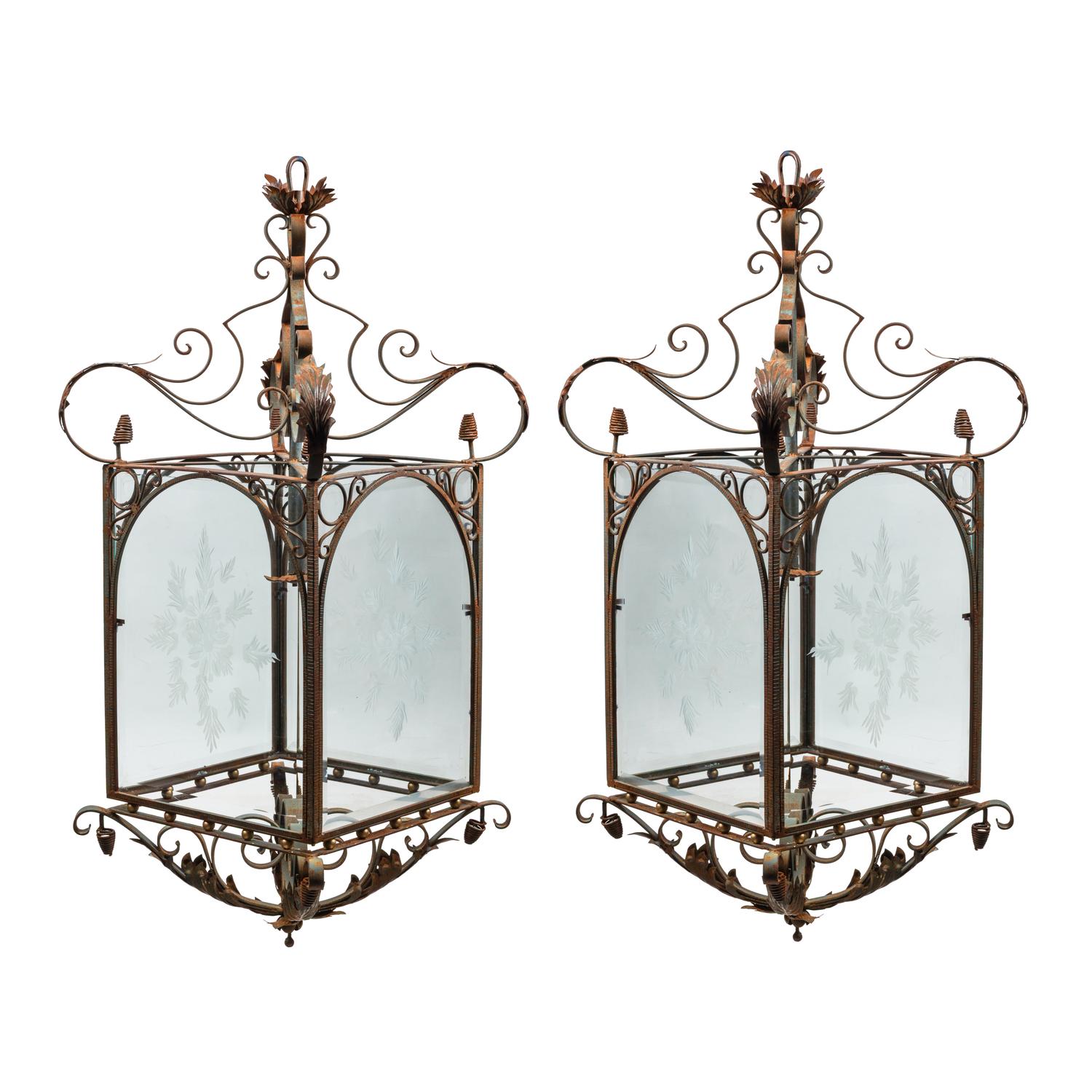 A Pair of Spanish Iron and Etched Glass Hall Lanterns