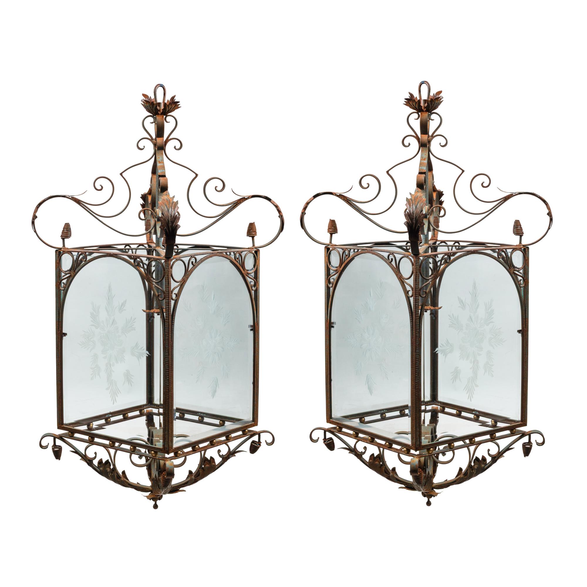 A Pair of Spanish Iron and Etched Glass Hall Lanterns