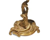 A group of six Louis XV style ormolu lighting accessories, 19th century