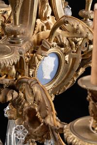 A Gilt-Bronze, Rock Crystal and Glass Twelve-Light Chandelier