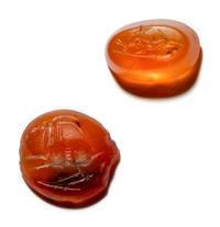 A Mycenean Carnelian Intaglio with a Stag and a Roman Carnelian Intaglio with a Racing Deer