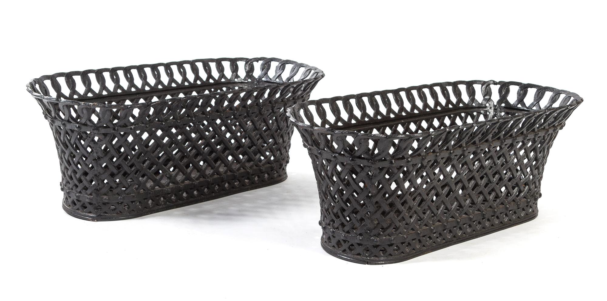 A Pair of Victorian Cast Iron Jardinieres Height 15 1/4 x width 33 3/4 x depth 12 inches.