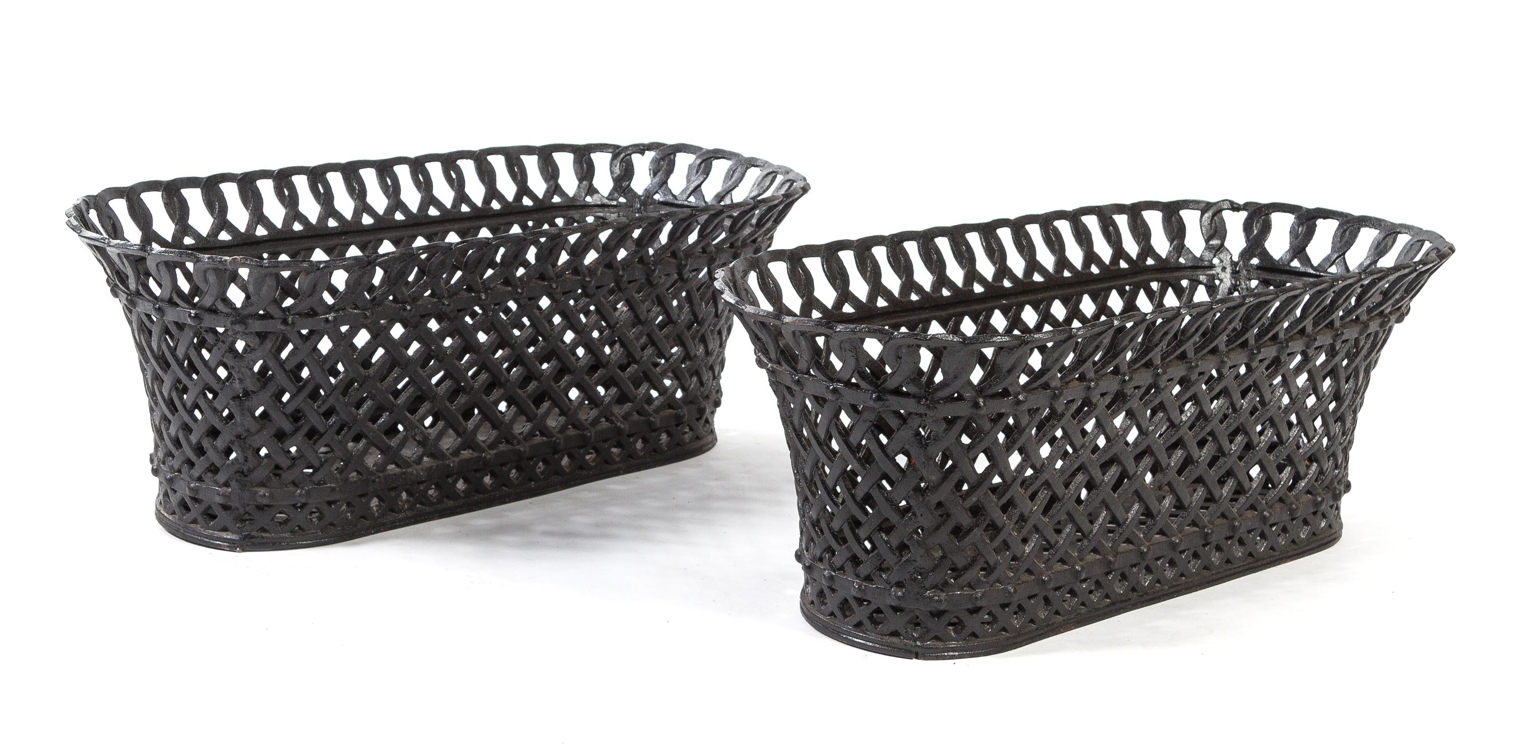 A Pair of Victorian Cast Iron Jardinieres Height 15 1/4 x width 33 3/4 x depth 12 inches.