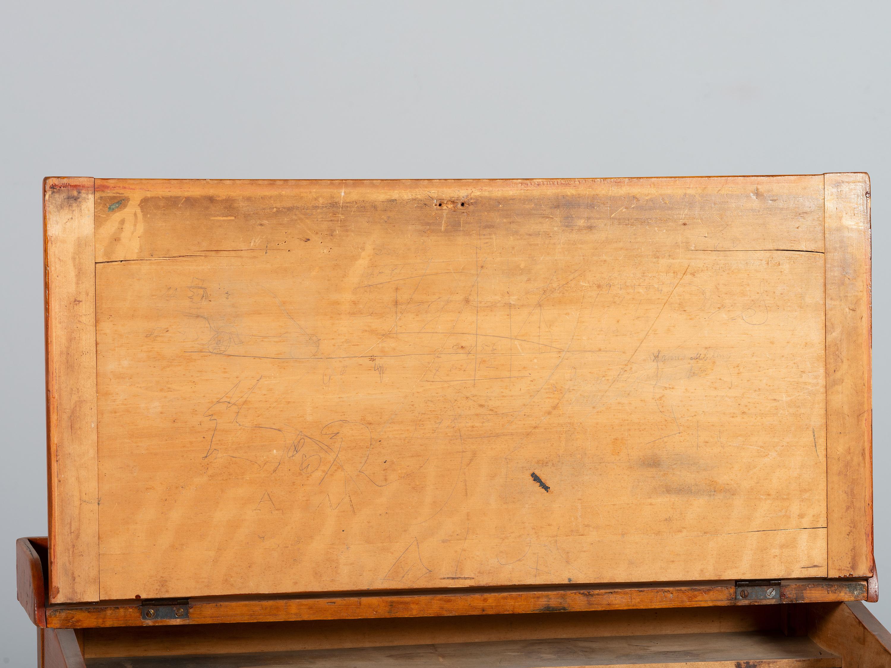 A Late Federal Red-Stained Pine One-Drawer Slant-Lid Schoolmaster's Desk