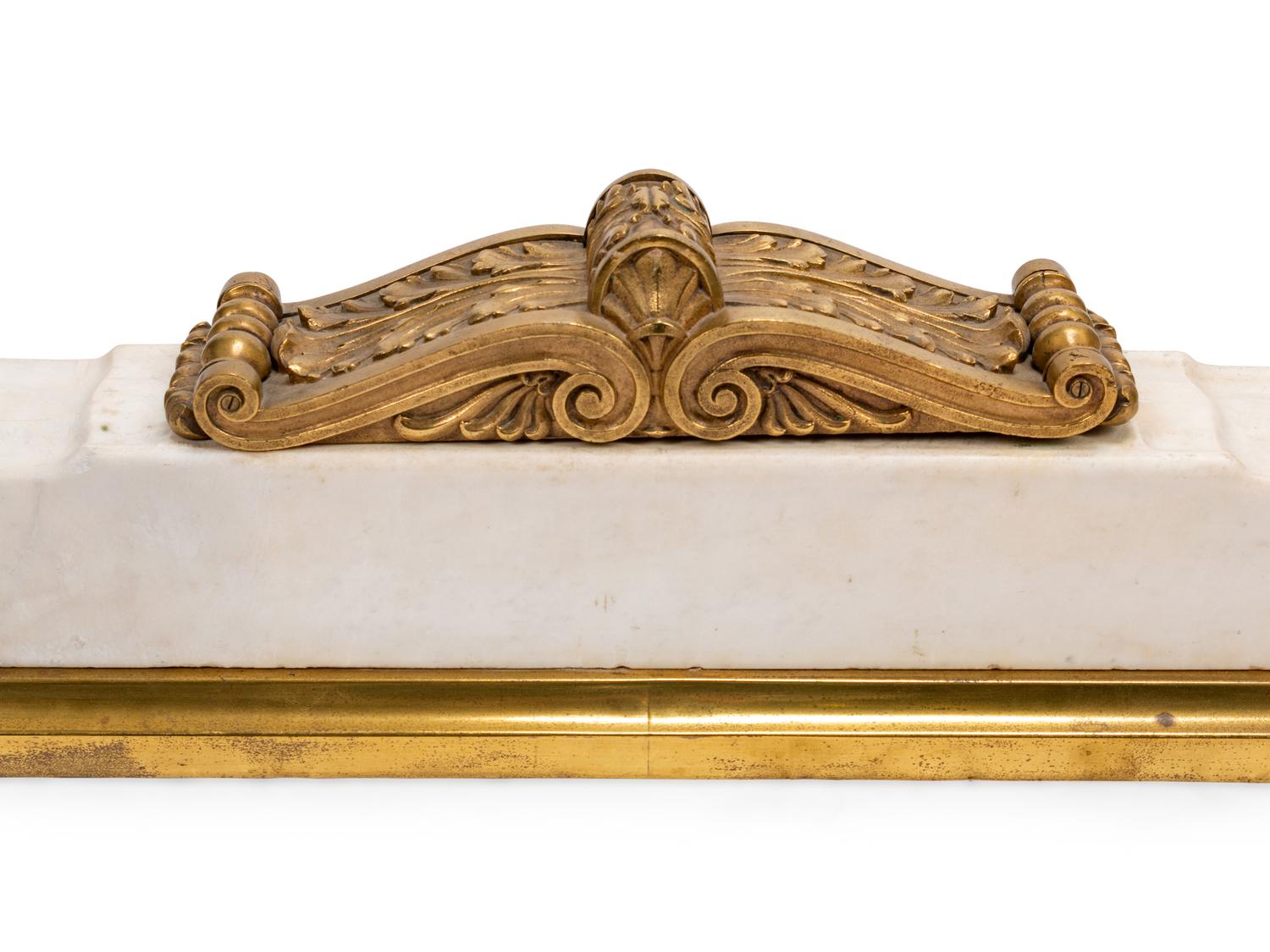 A Continental Gilt Bronze and Marble Fireplace Suite
