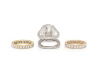 DIAMOND AND PLATINUM RING WITH PAIR OF ETERNITY BANDS