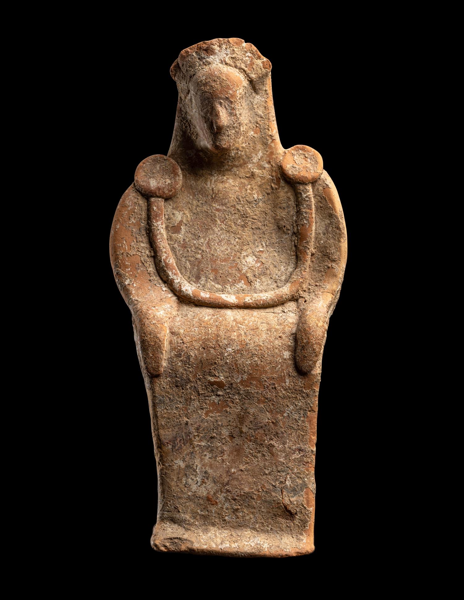 A Greek Terracotta Enthroned Goddess