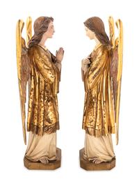 A Pair of Italian Painted and Parcel Gilt Figures of Angels