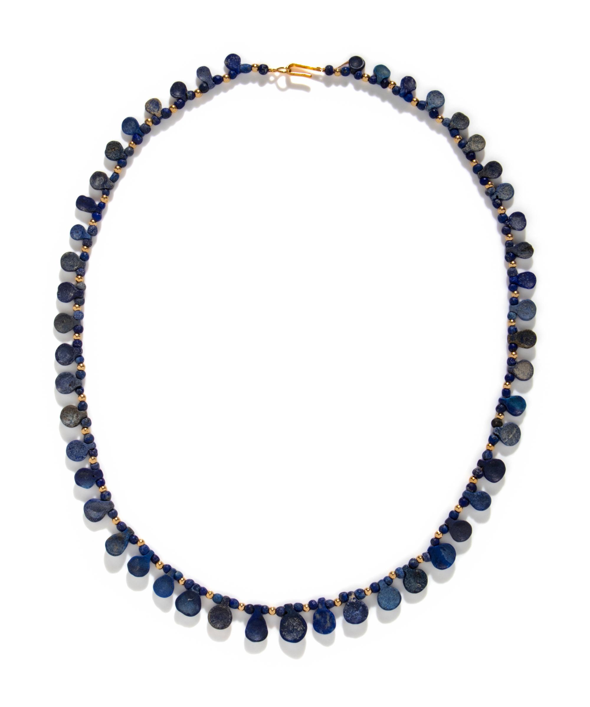 A Western Asiatic Lapis Lazuli and Gold Bead Necklace