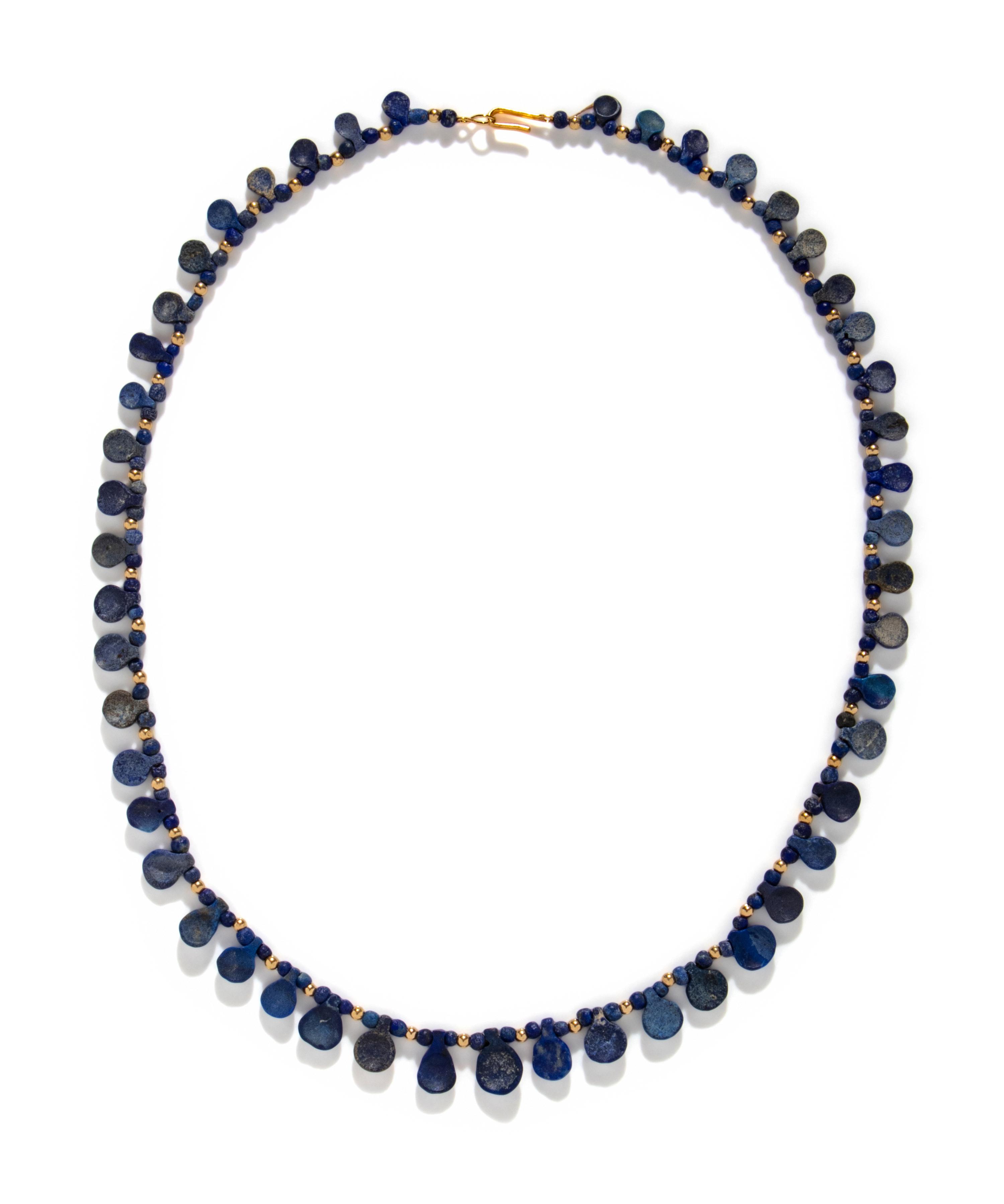 A Western Asiatic Lapis Lazuli and Gold Bead Necklace