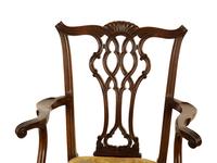 A Set of Fourteen George III Style Mahogany Dining Chairs
